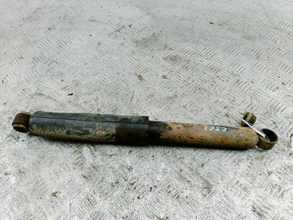 Амортизатор задний левый