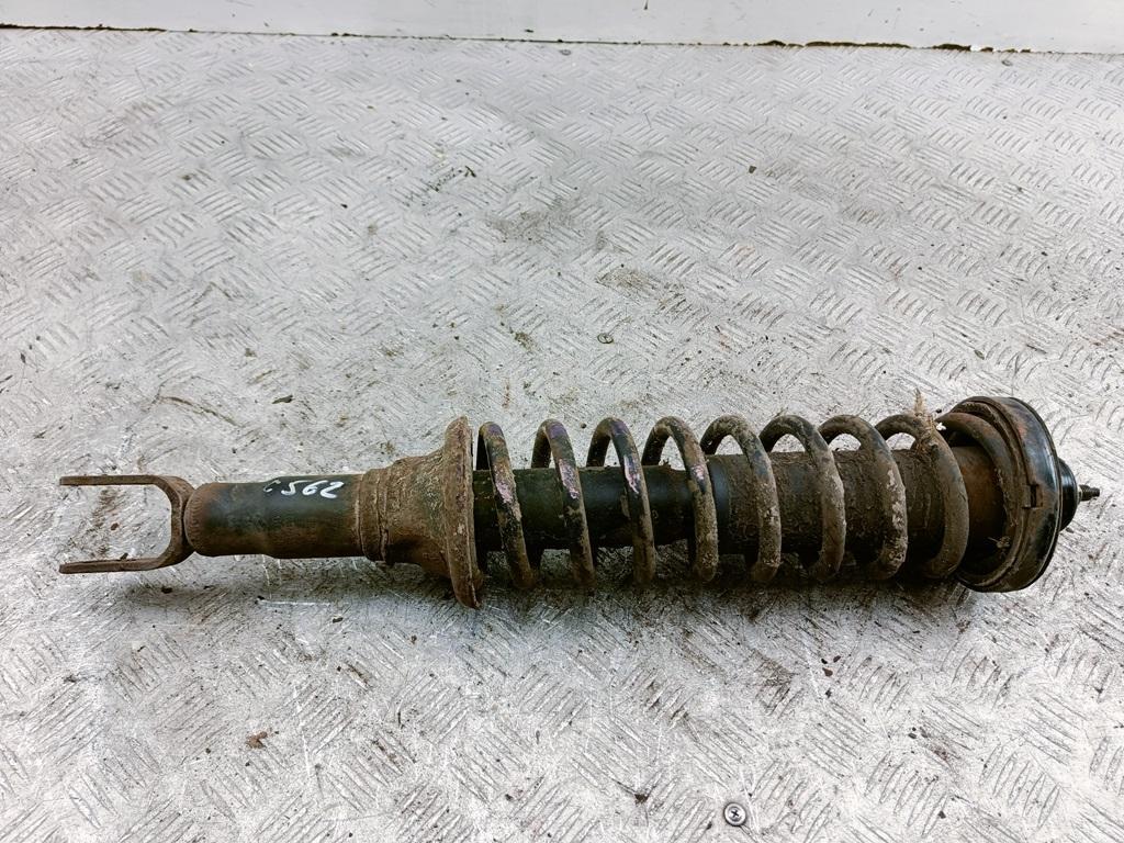 Амортизатор задний левый