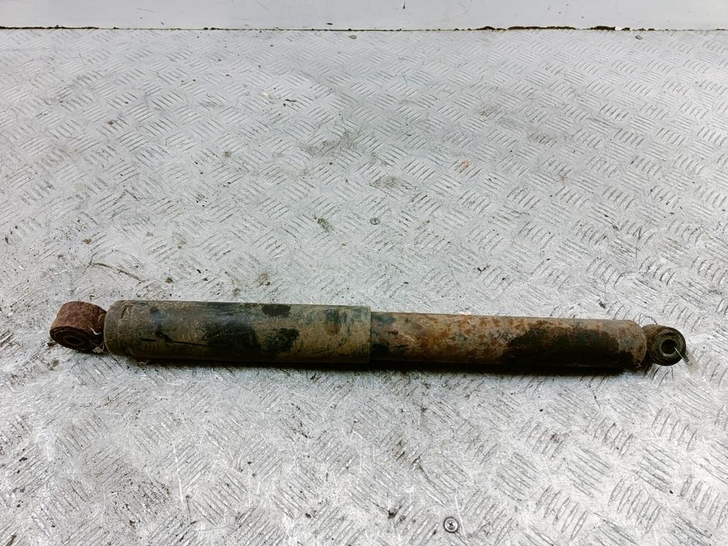 Амортизатор задний левый