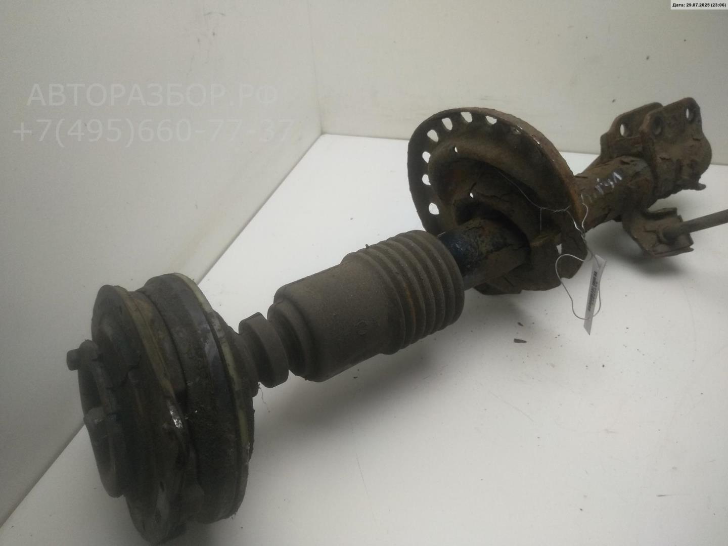 Амортизатор передний левый