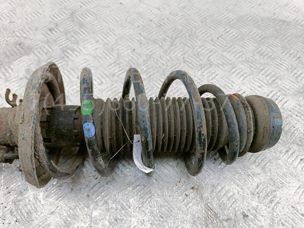 Амортизатор передний левый