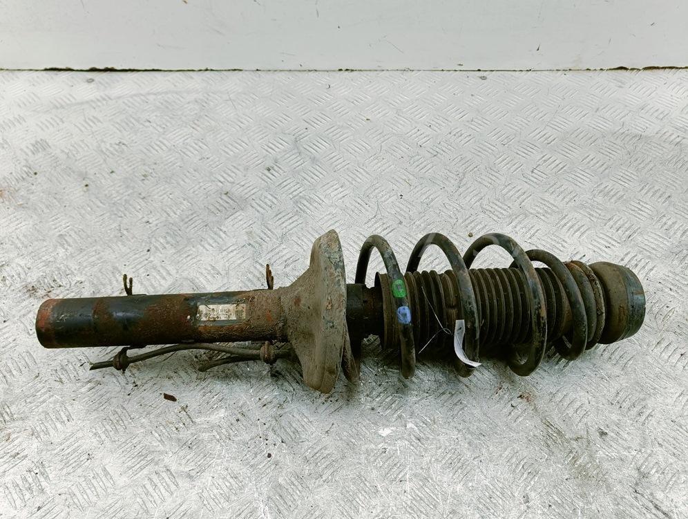 Амортизатор передний левый