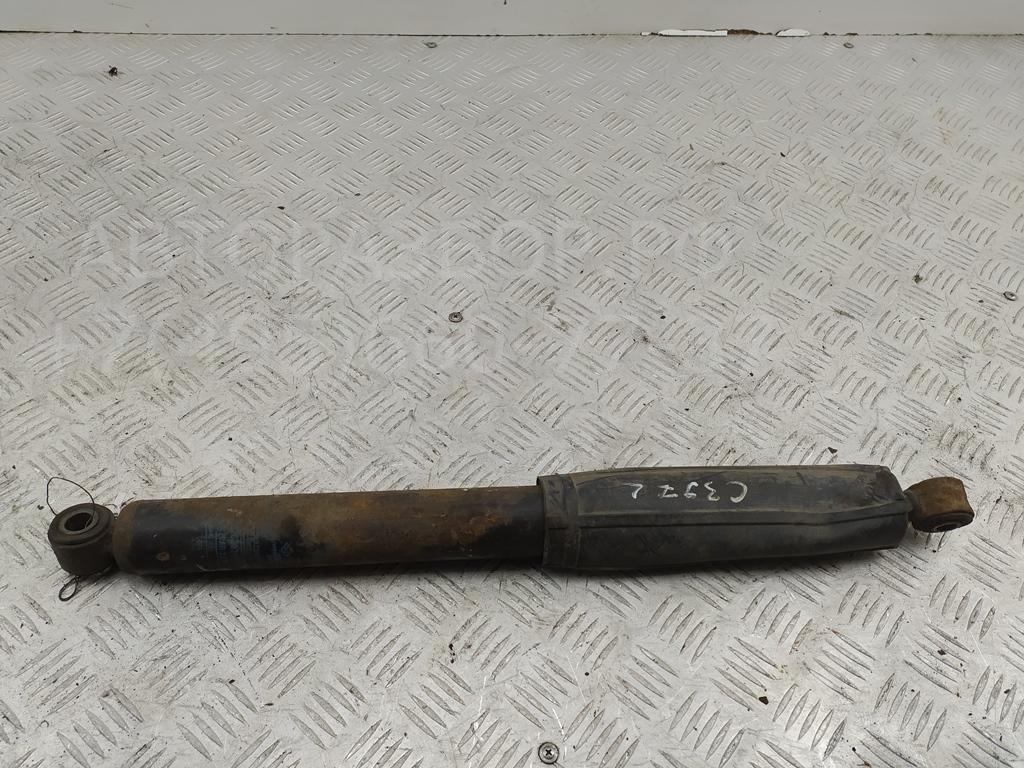 Амортизатор задний левый