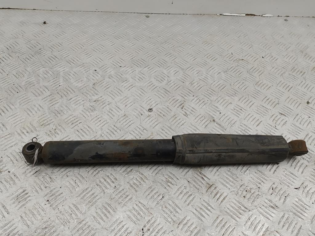 Амортизатор задний левый