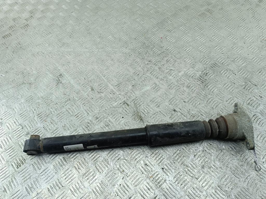 Амортизатор задний левый