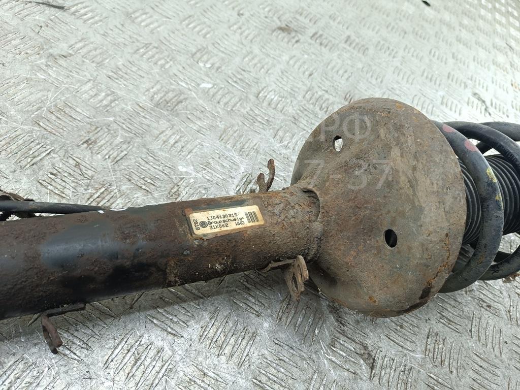 Амортизатор передний левый