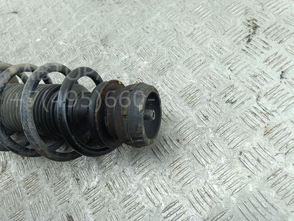 Амортизатор передний левый