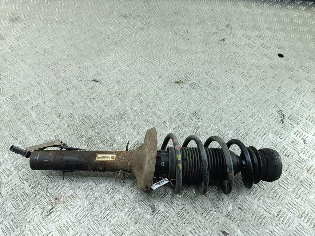 Амортизатор передний левый