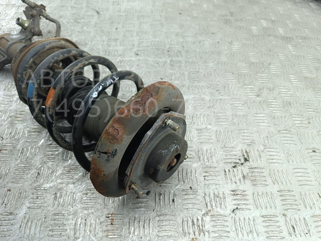 Амортизатор передний левый