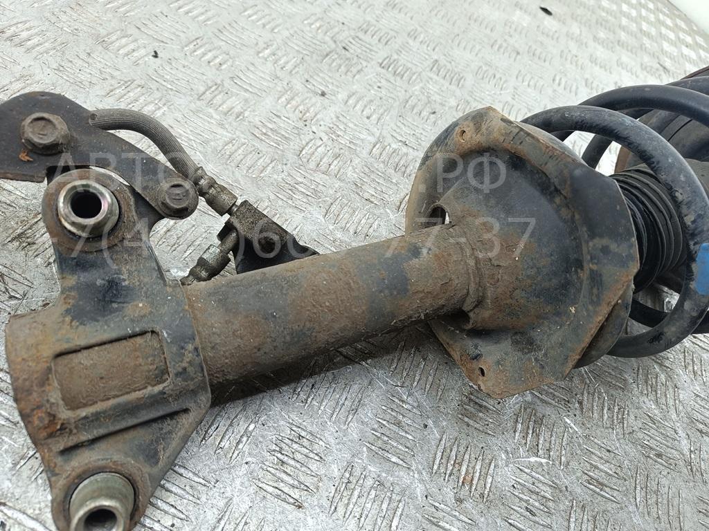 Амортизатор передний левый