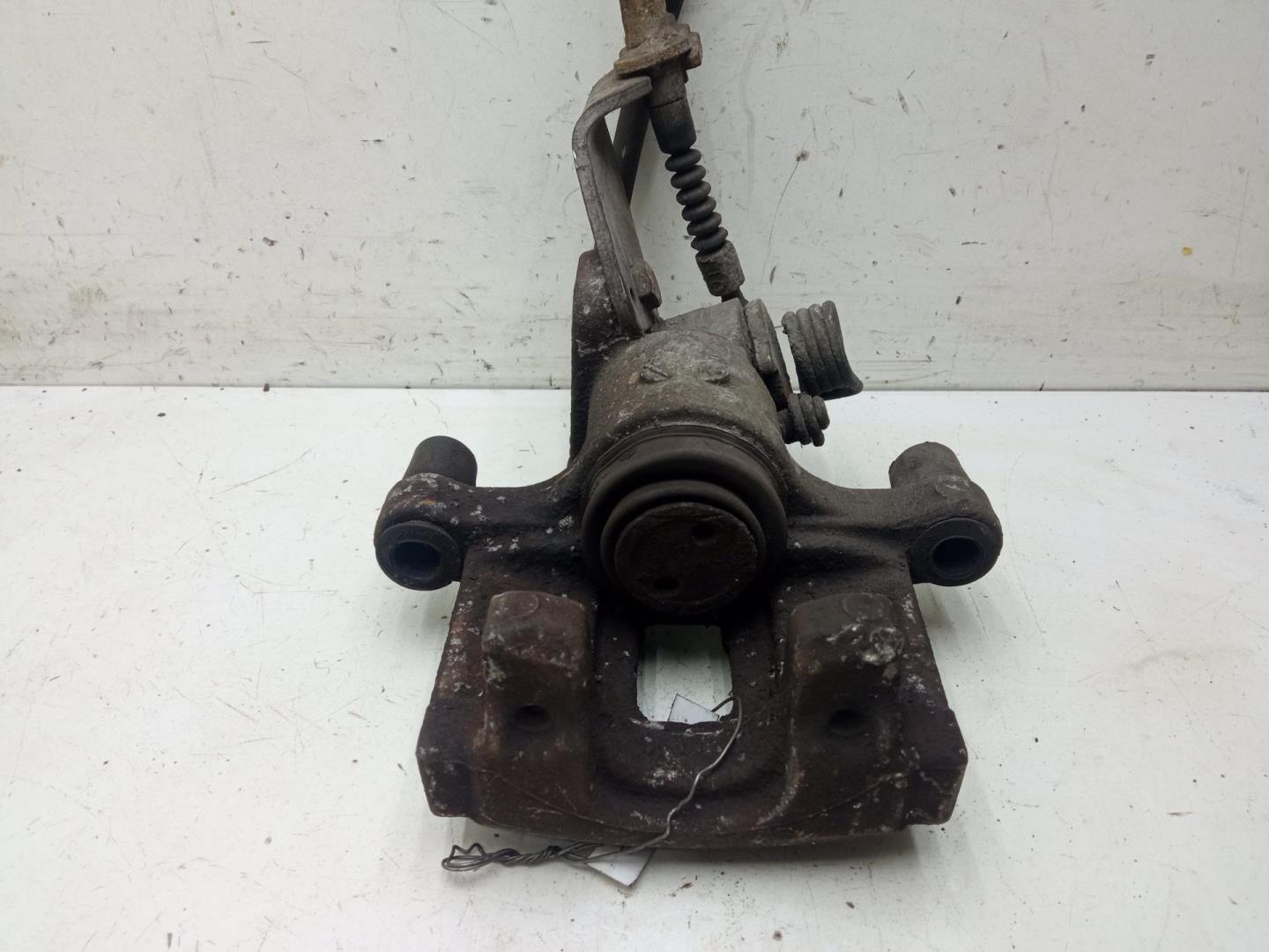 Суппорт задний левый