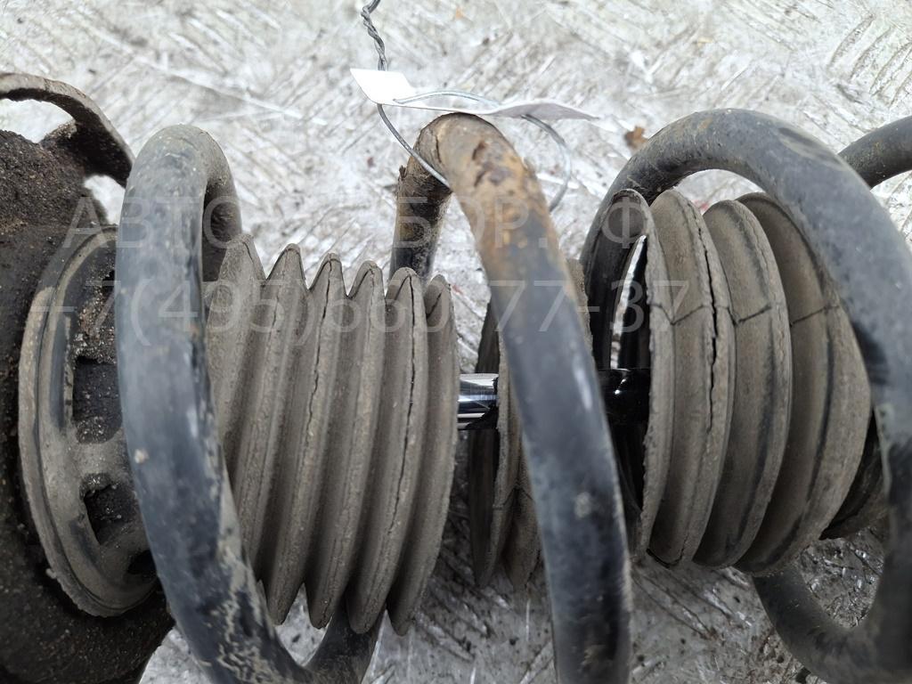 Амортизатор задний левый