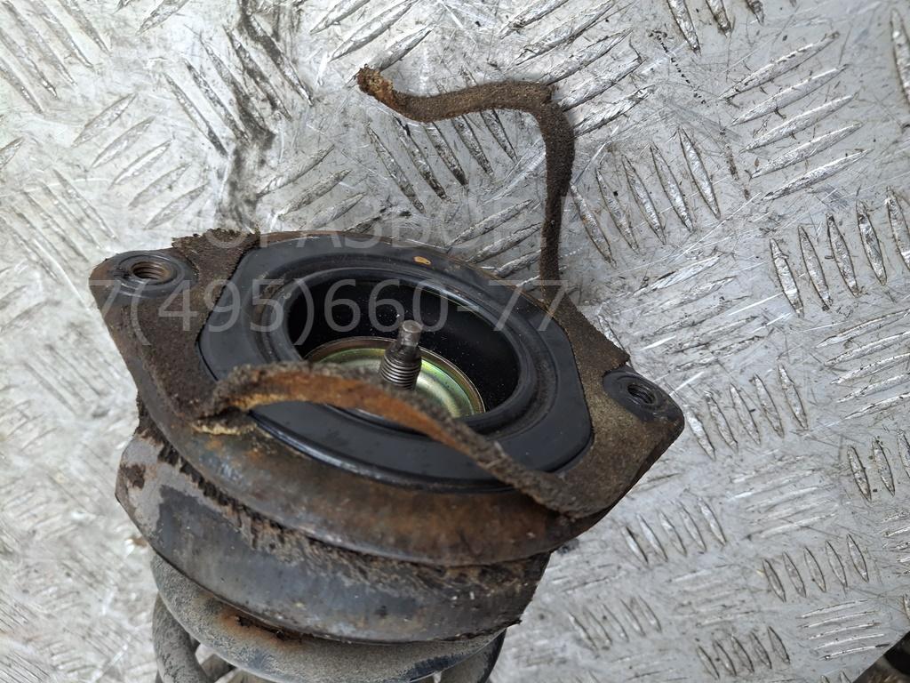 Амортизатор задний левый