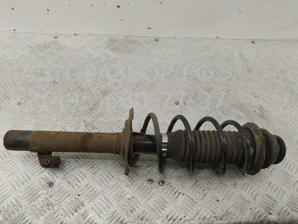 Амортизатор передний левый