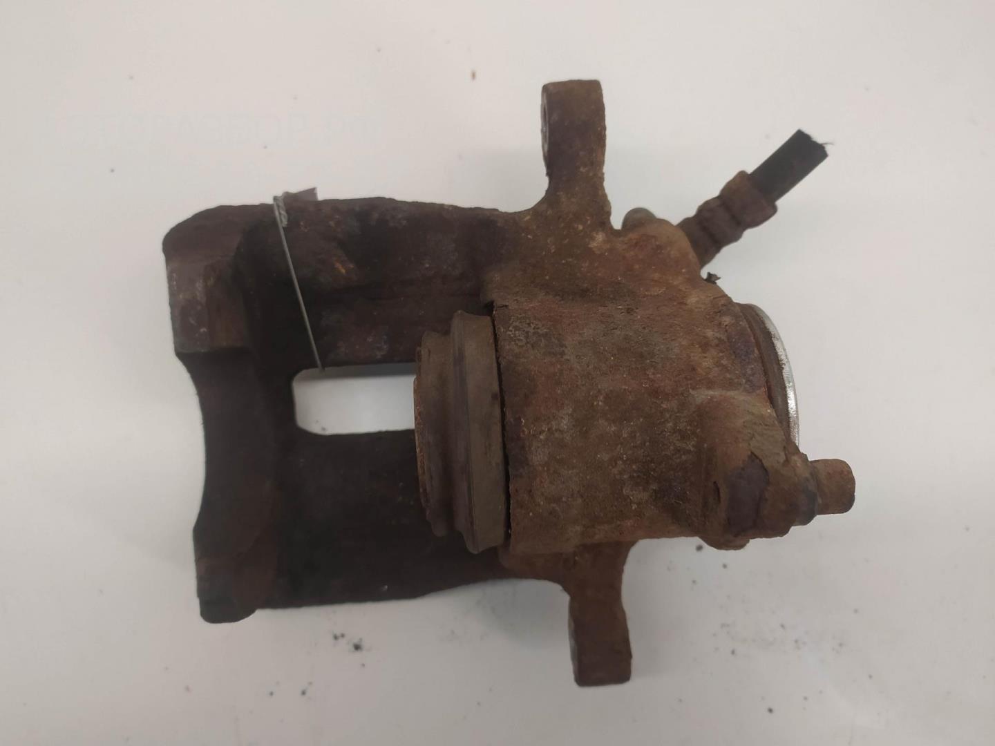 Суппорт задний левый