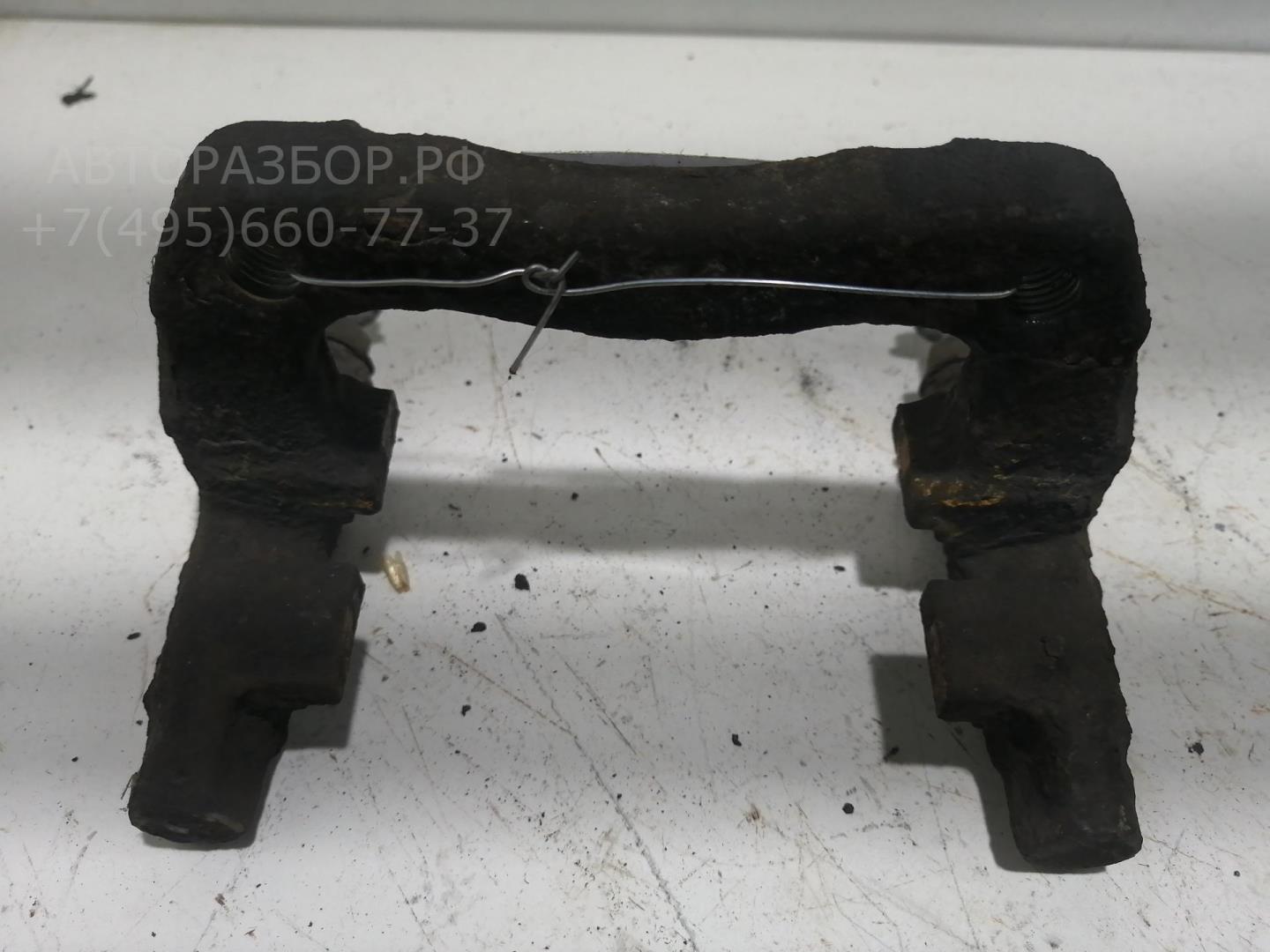 Скоба суппорта заднего