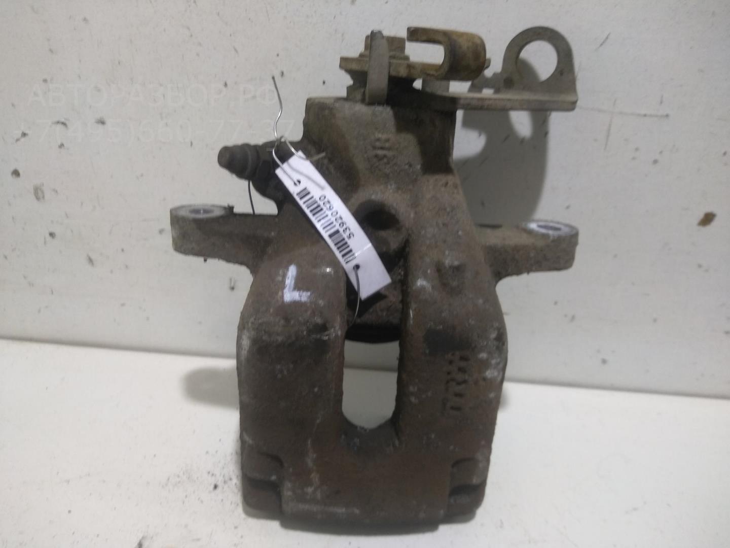 Суппорт задний левый