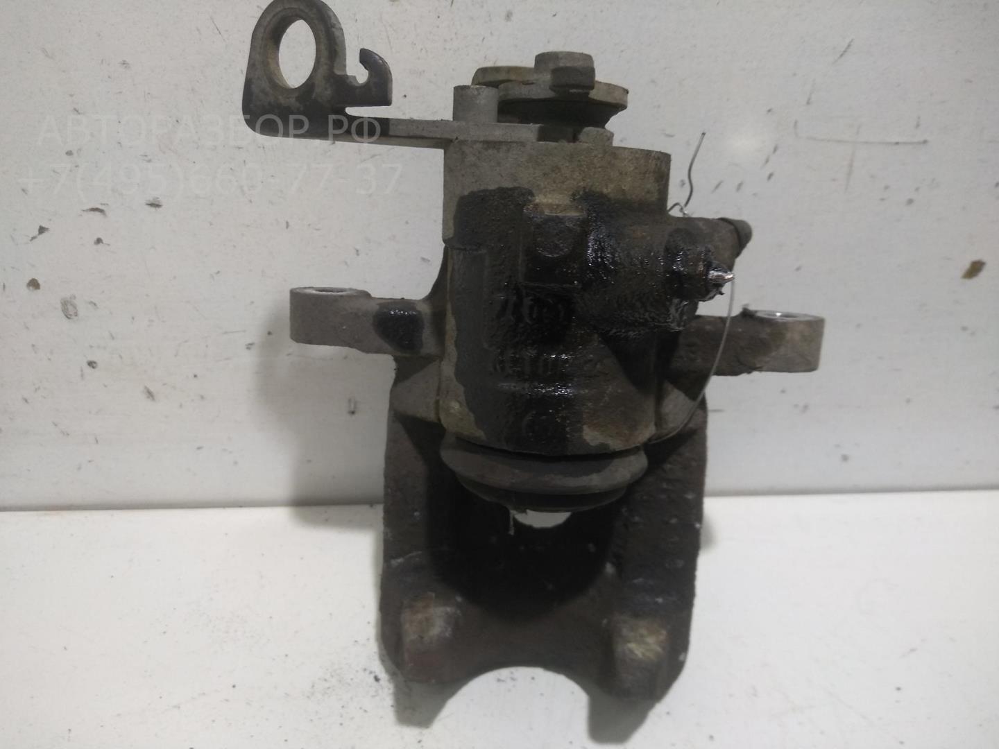 Суппорт задний левый