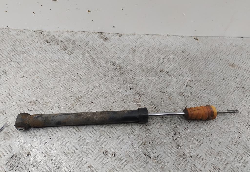 Амортизатор задний левый