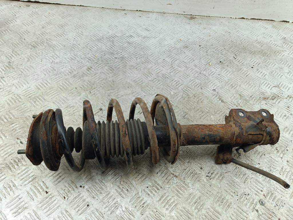 Амортизатор передний левый