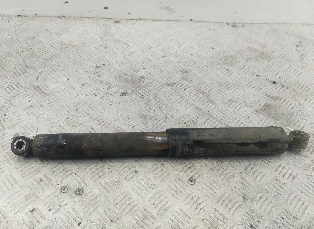 Амортизатор задний левый