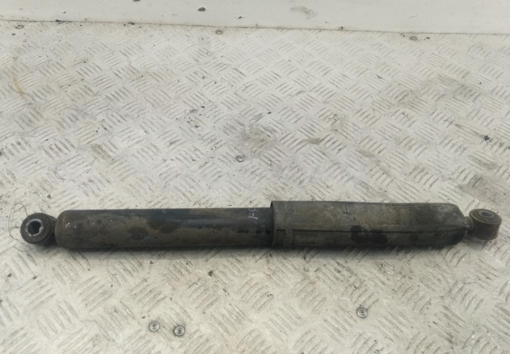 Амортизатор задний левый