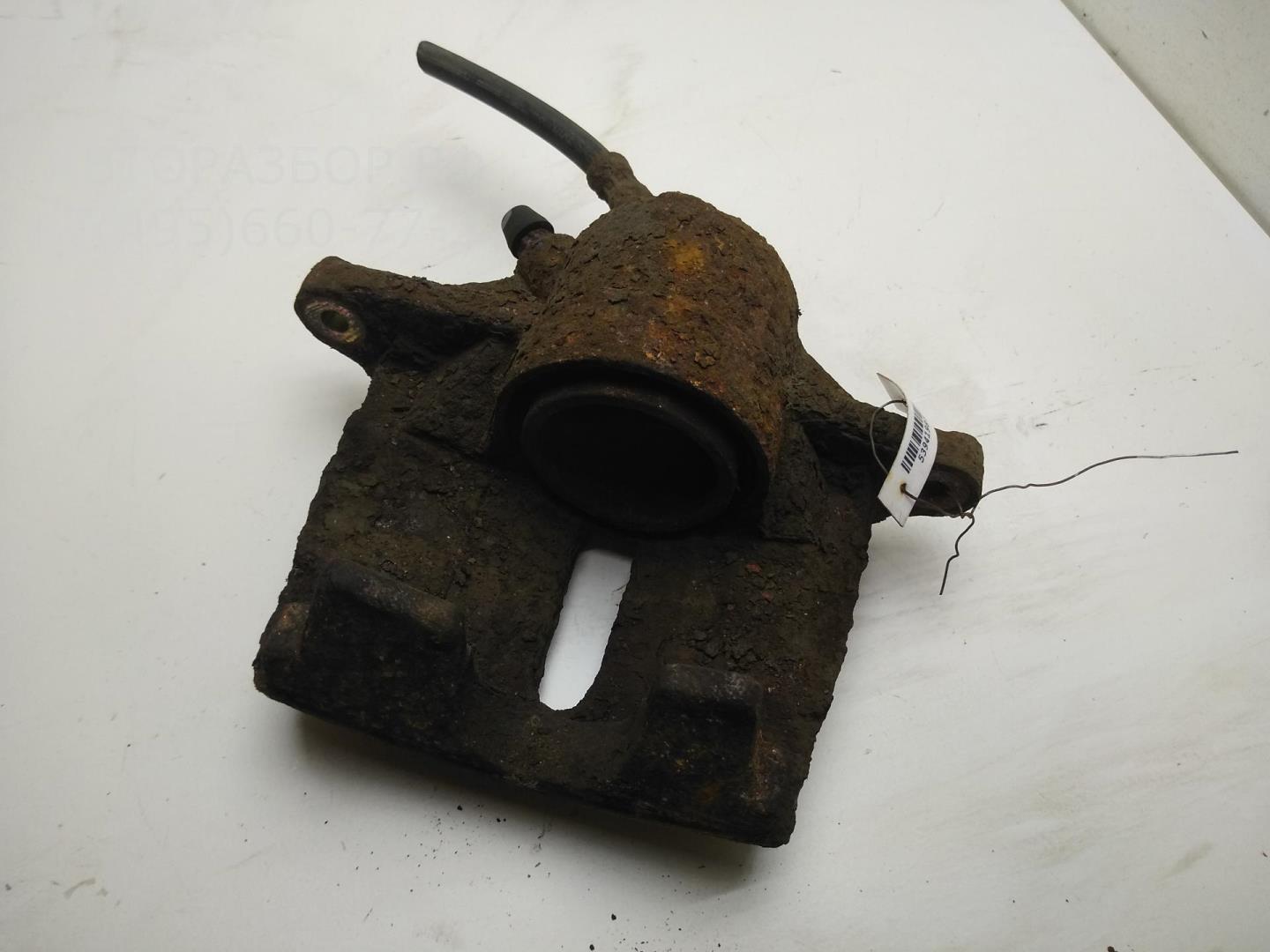 Суппорт передний левый