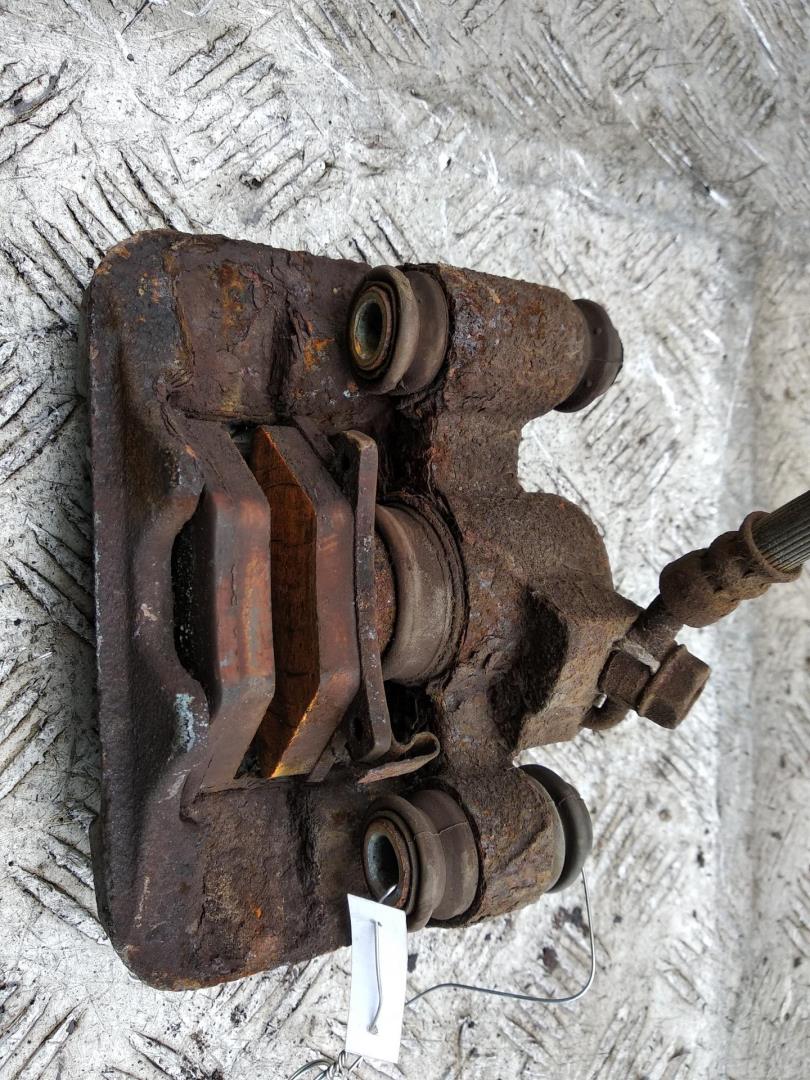 Суппорт задний левый