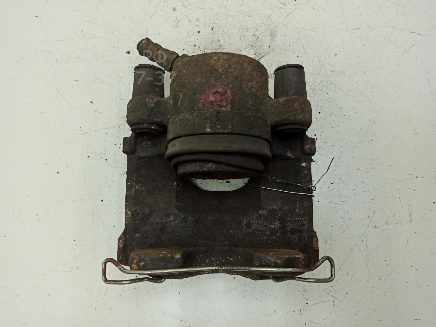 Суппорт передний левый