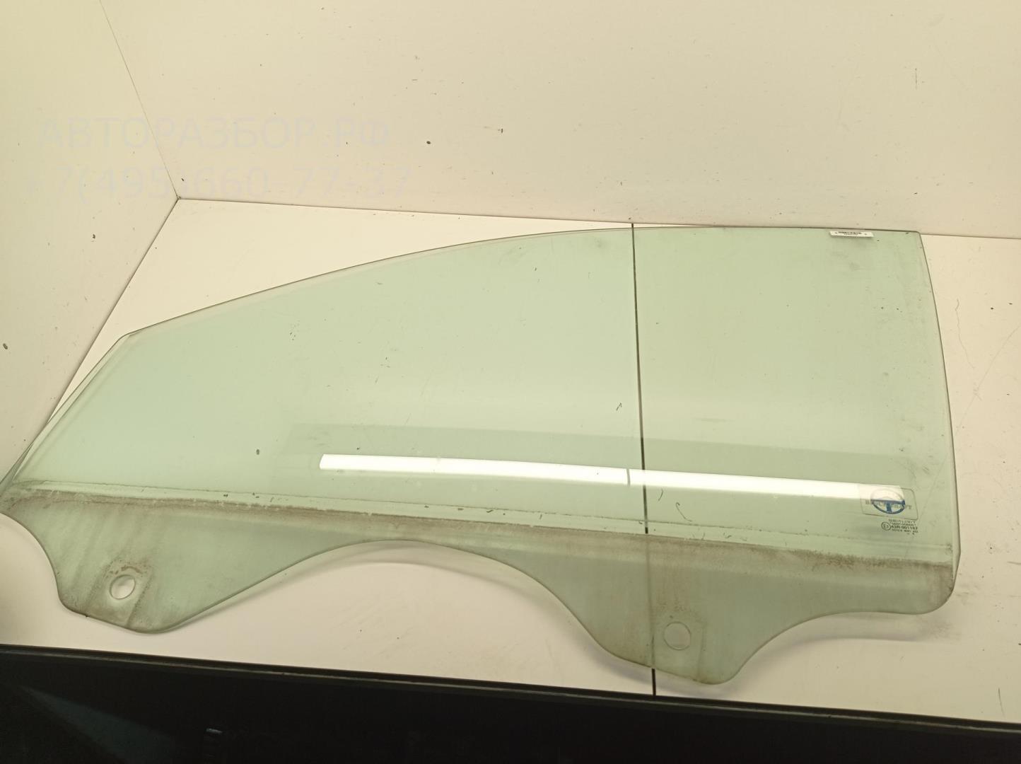 Стекло двери передней левой