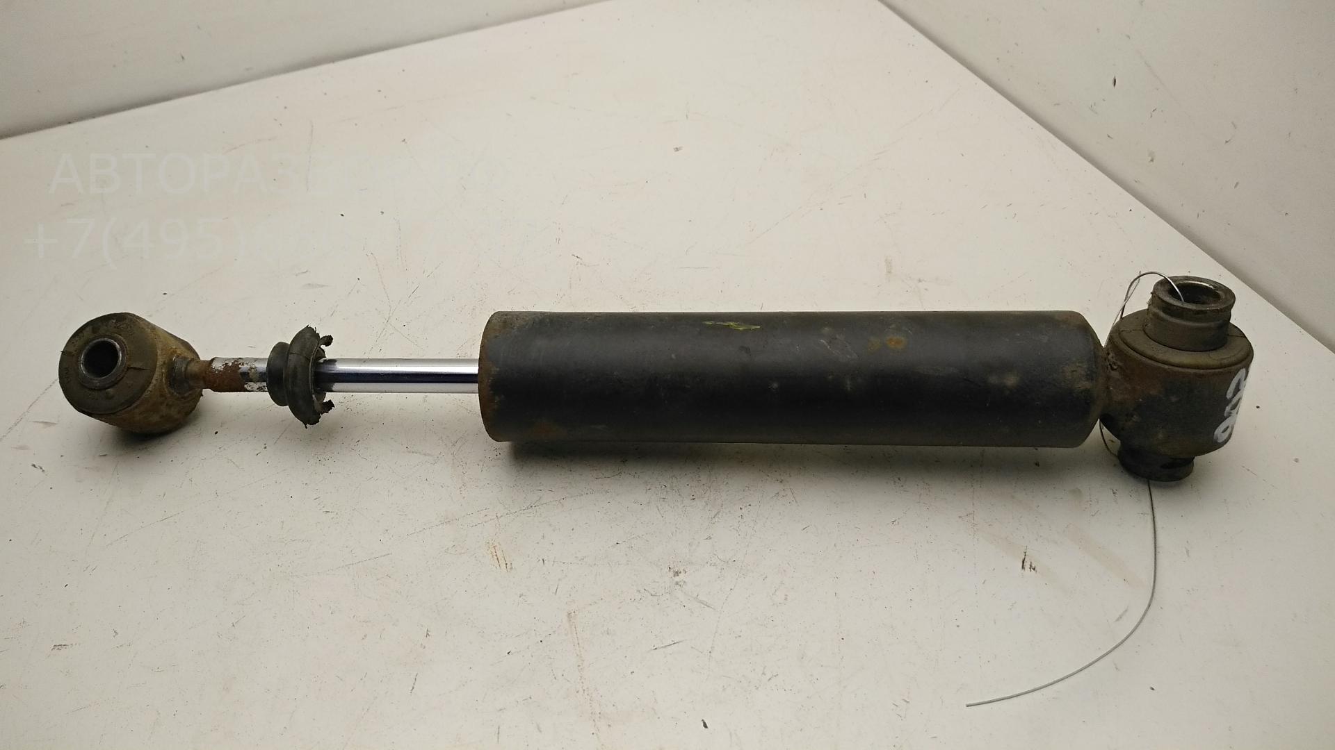 Амортизатор задний левый