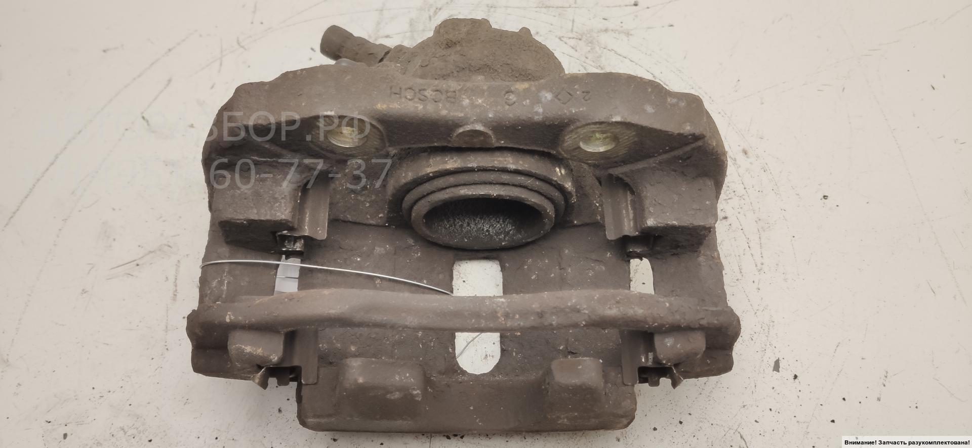 Суппорт передний левый