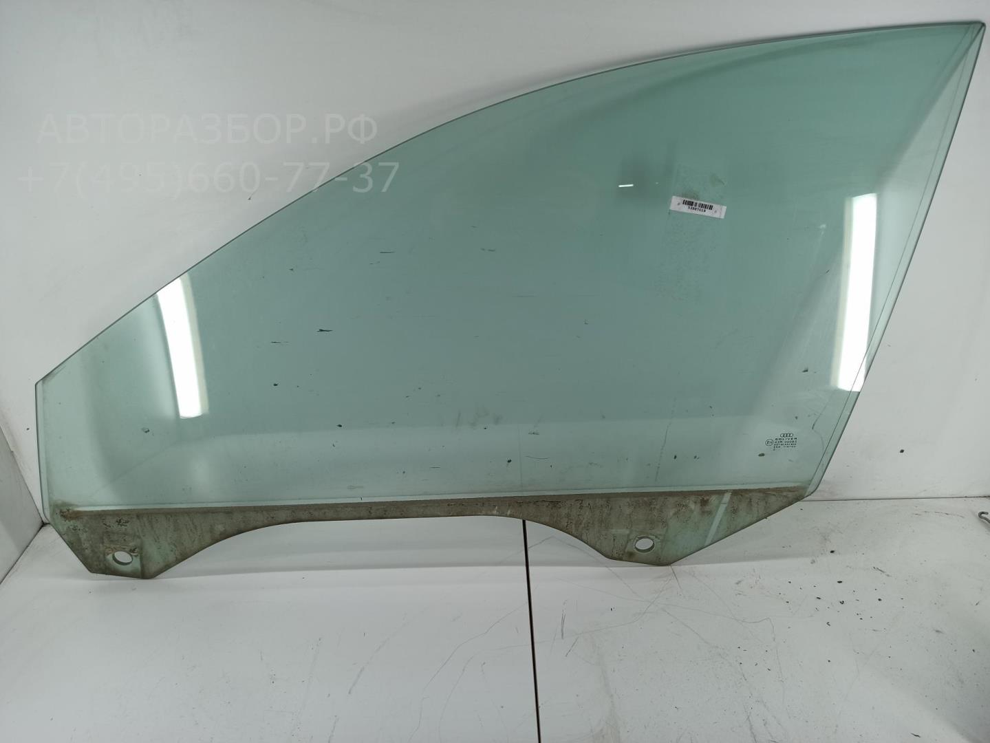 Стекло двери передней левой