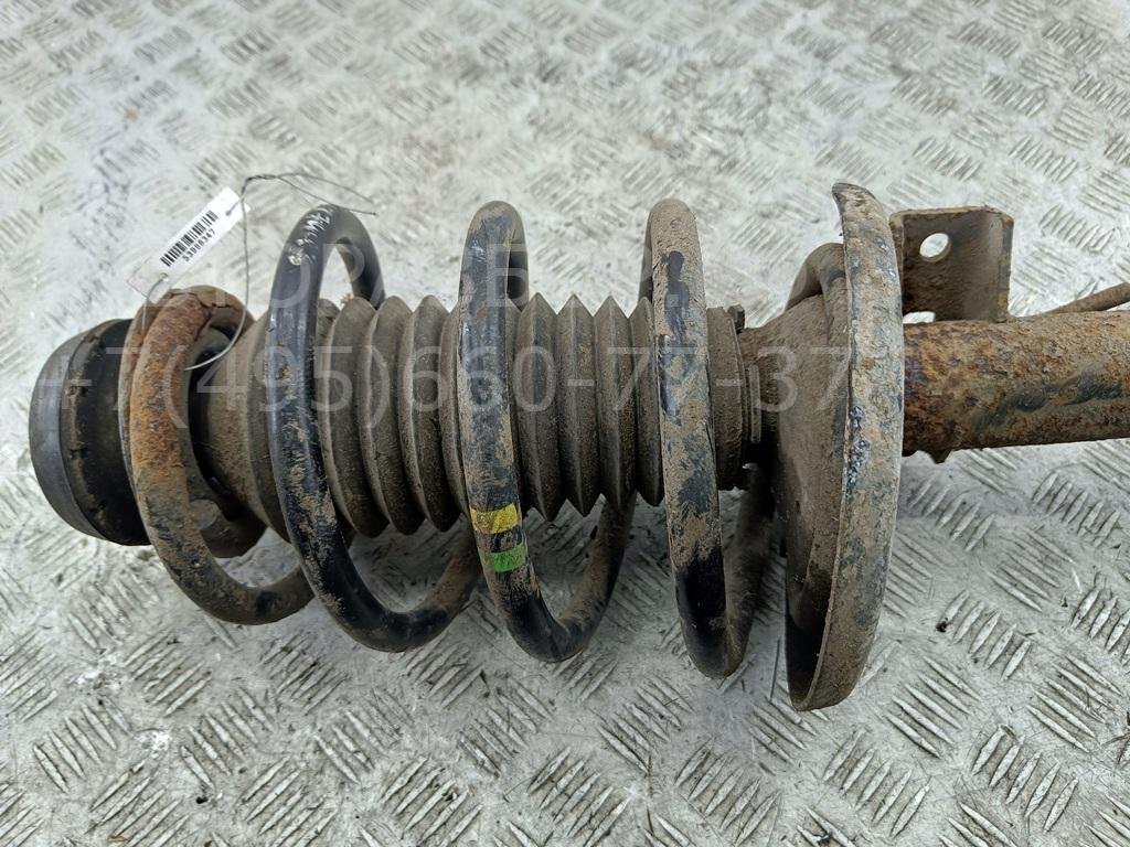 Амортизатор передний левый