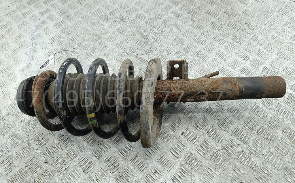 Амортизатор передний левый