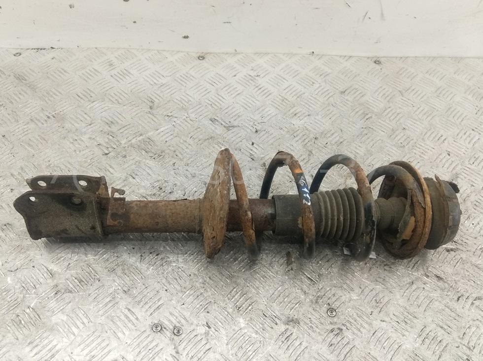 Амортизатор передний левый