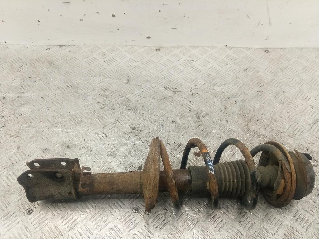 Амортизатор передний левый