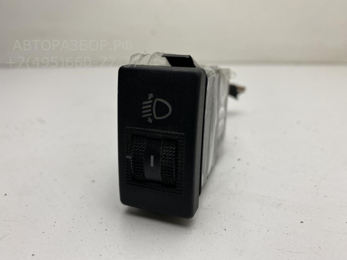 Кнопка корректора фар