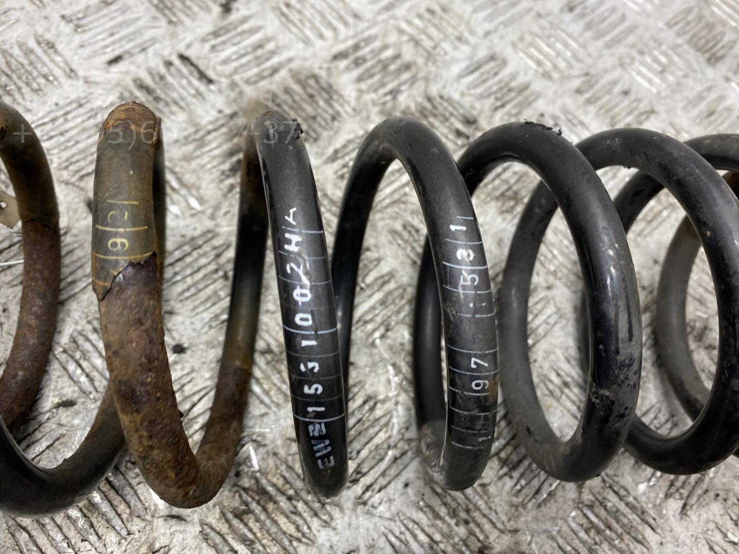 Пружина задняя