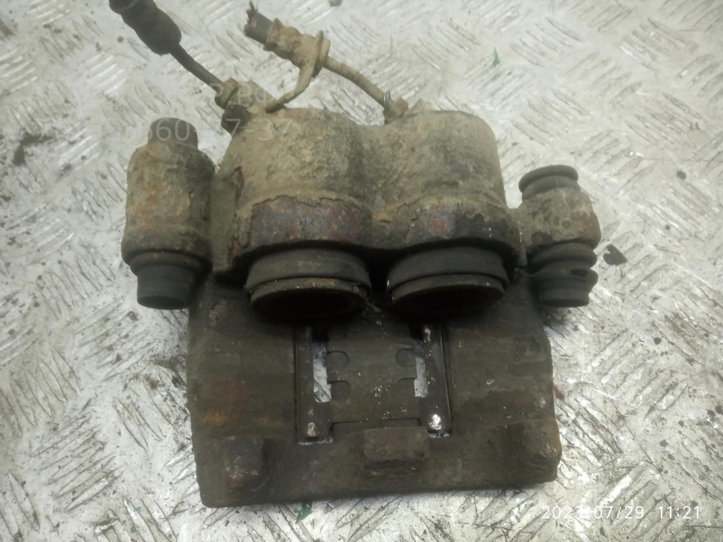 Суппорт передний левый