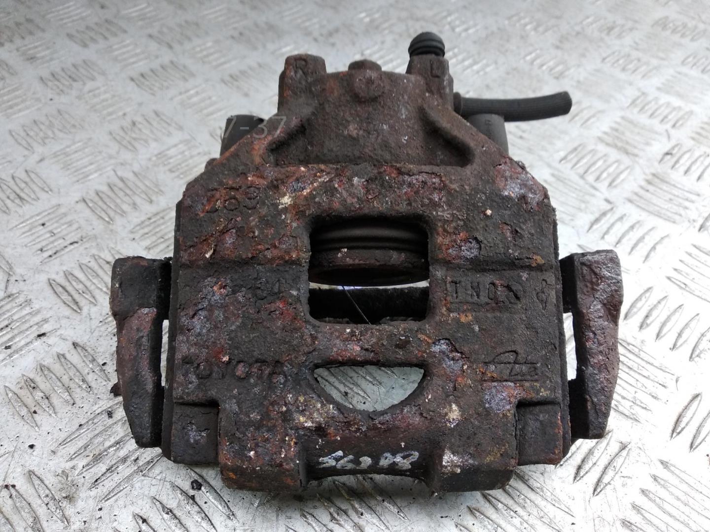 Суппорт передний левый