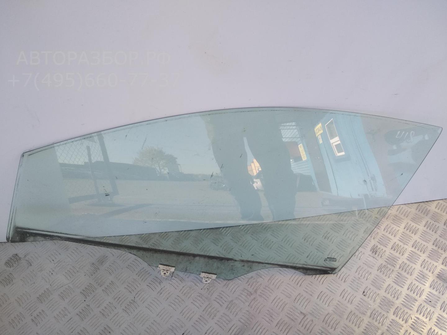 Стекло двери передней левой