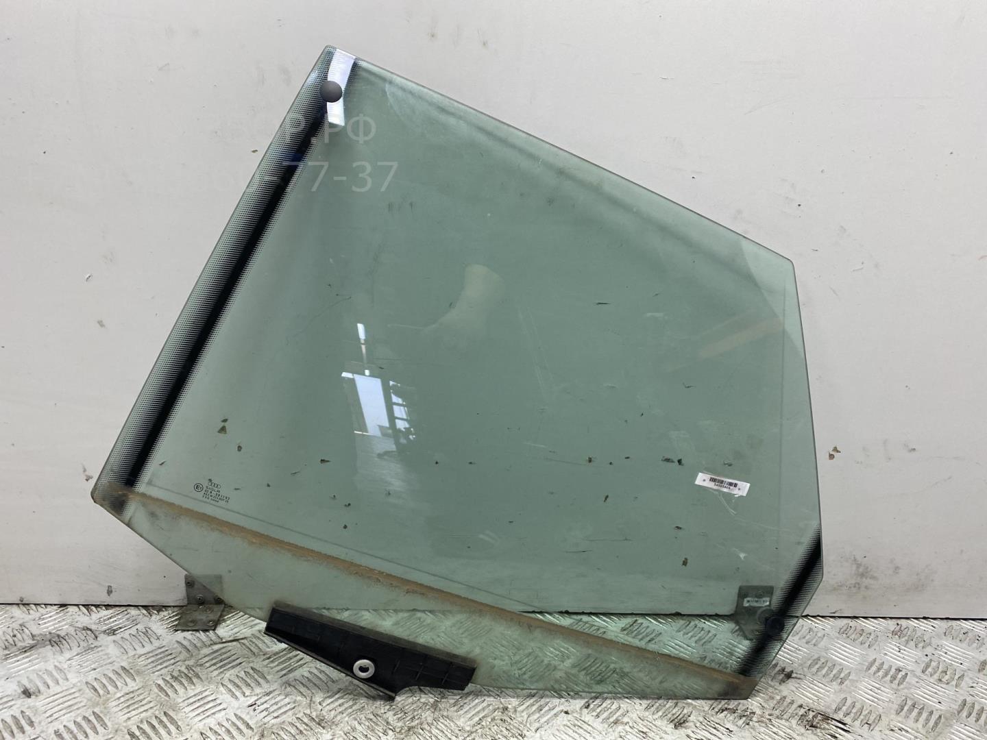 Стекло двери задней левой