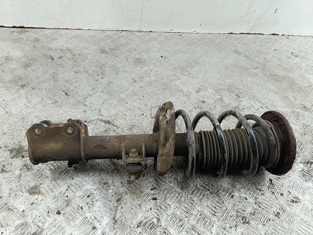 Амортизатор передний левый