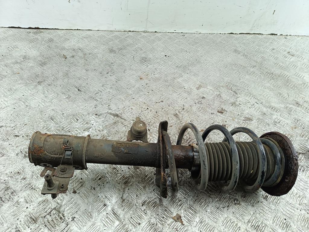 Амортизатор передний левый