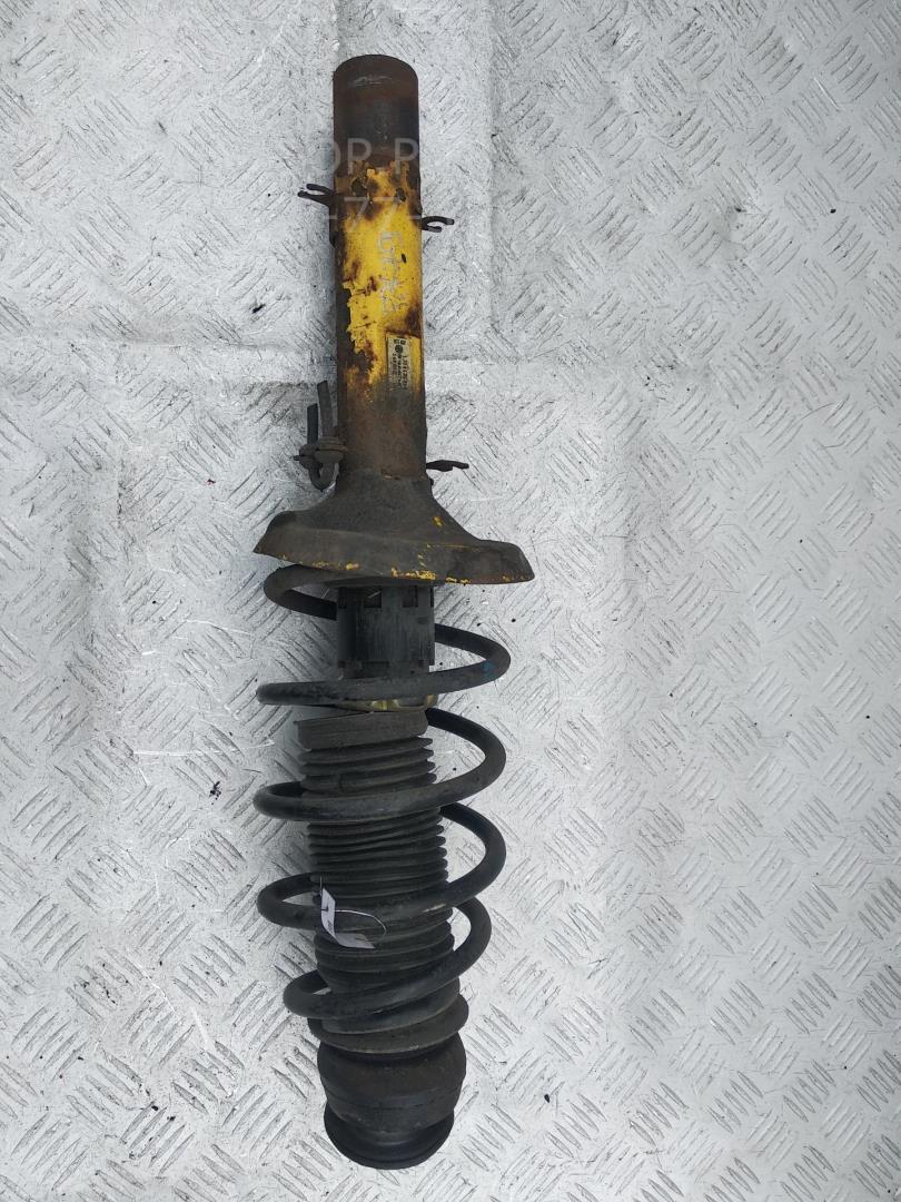 Амортизатор передний левый