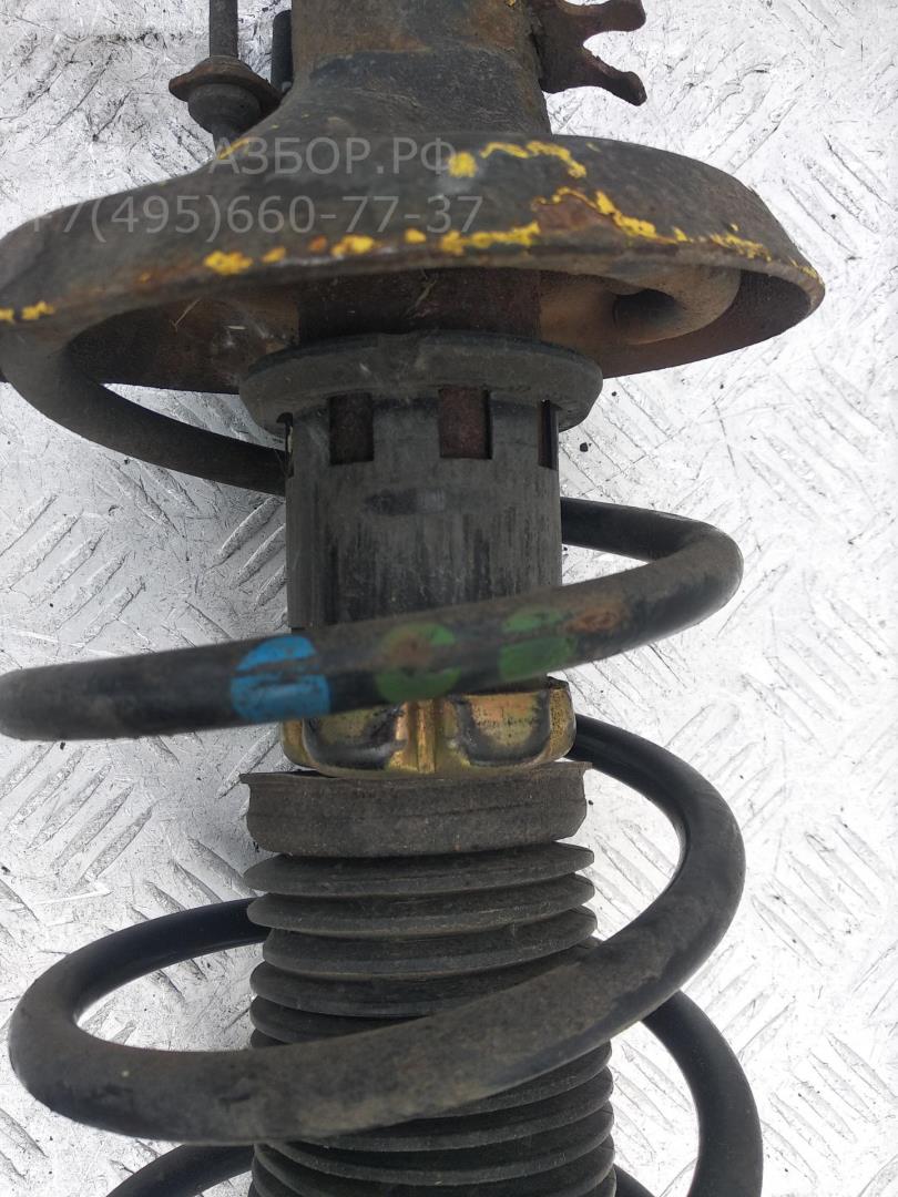 Амортизатор передний левый