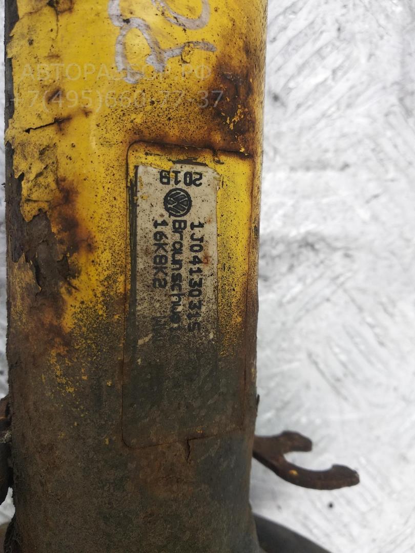 Амортизатор передний левый