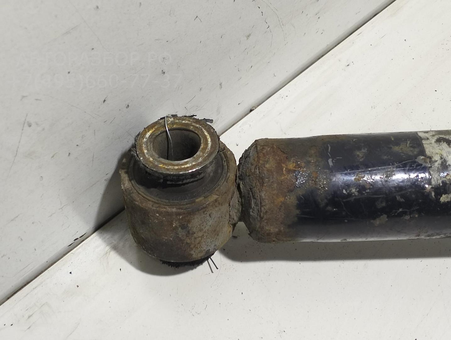 Амортизатор передний левый