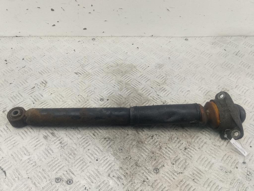 Амортизатор задний левый